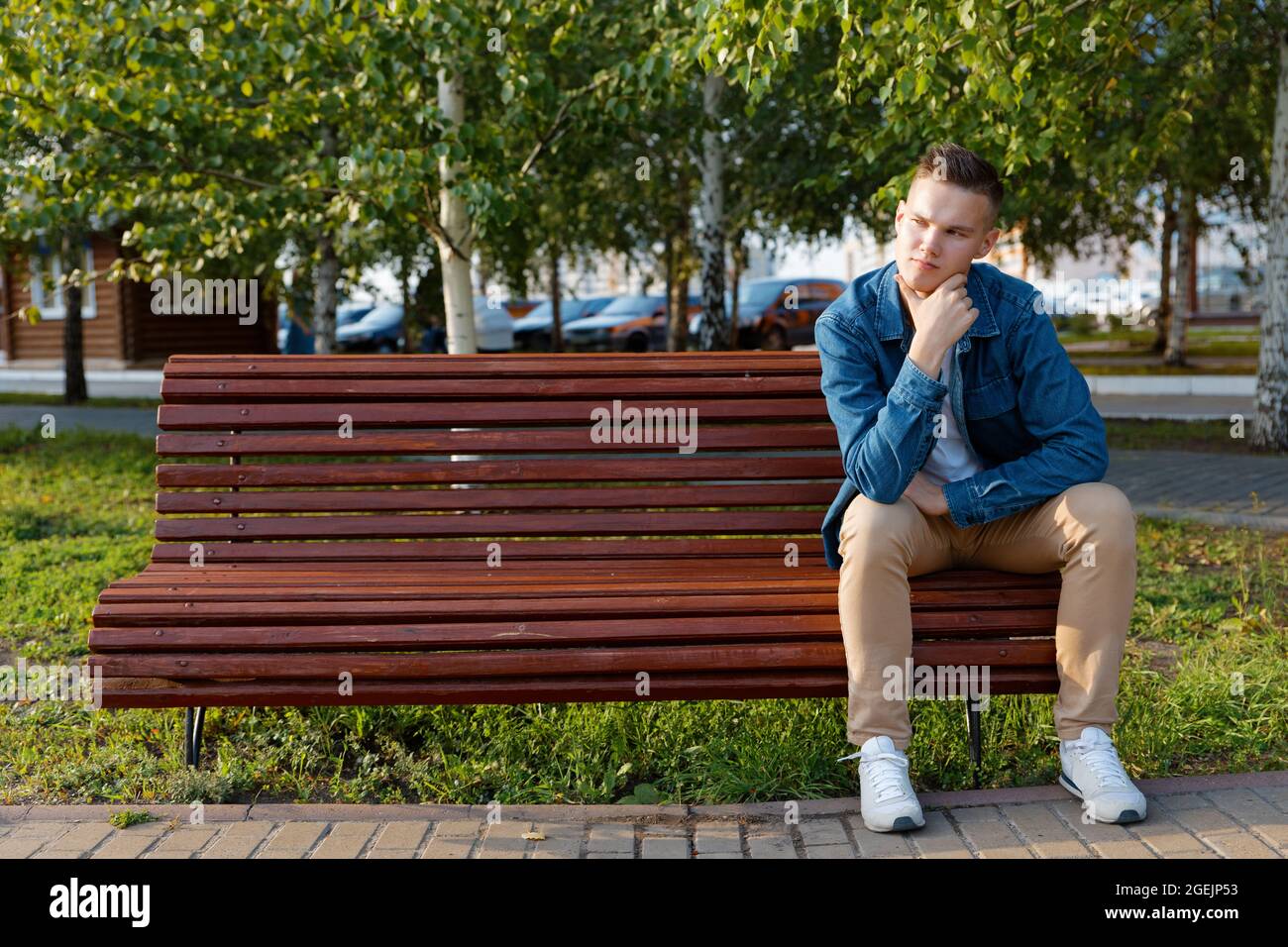 Handsome pensive young man hi-res stock photography and images - Alamy