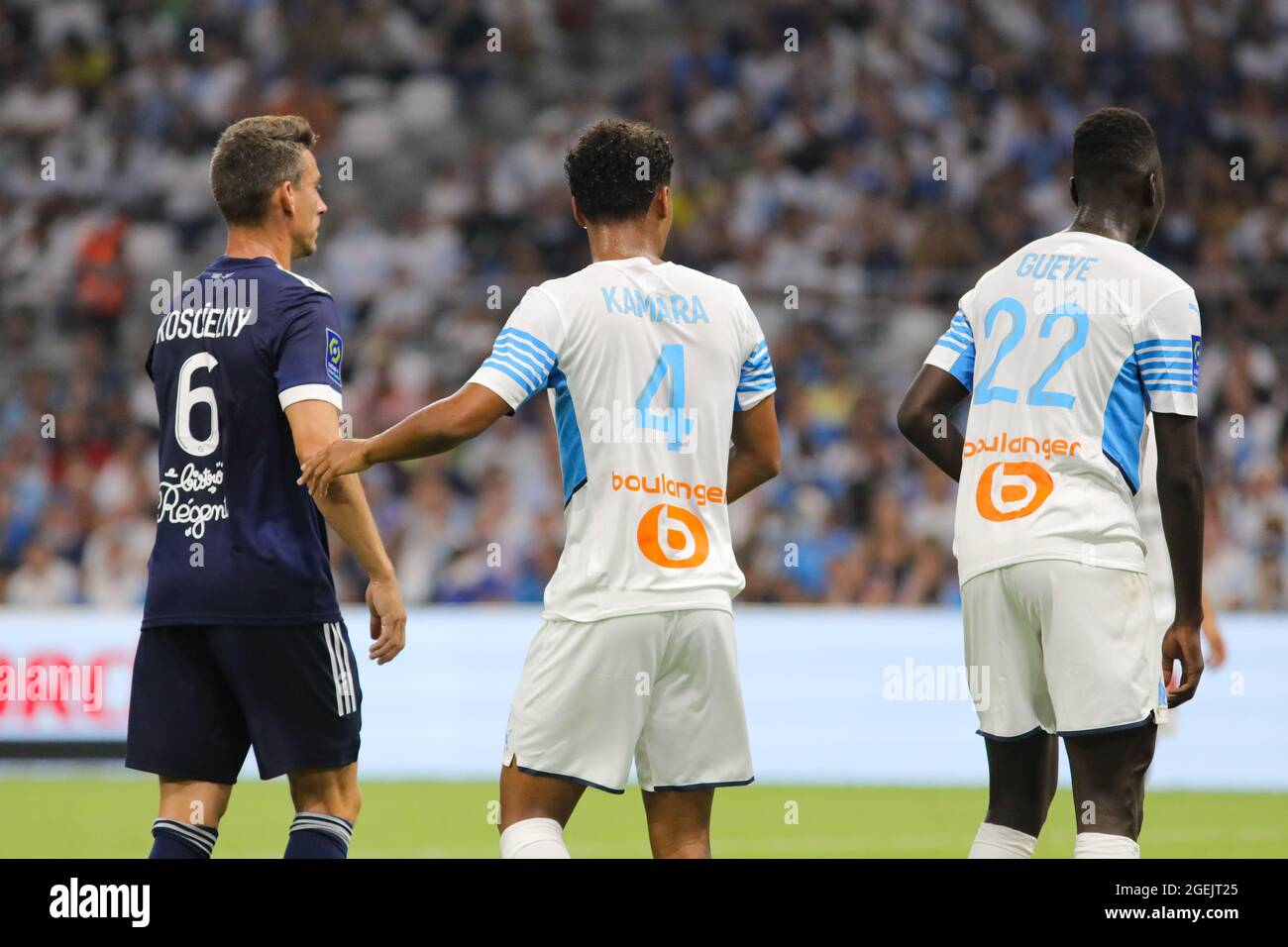 (L-R) L. Koscielny of Bordeaux, Kamara and Gueye of Marseille during the Ligue 1 Uber Eats match between Marseille and Bordeaux at Orange Velodrome on Stock Photo