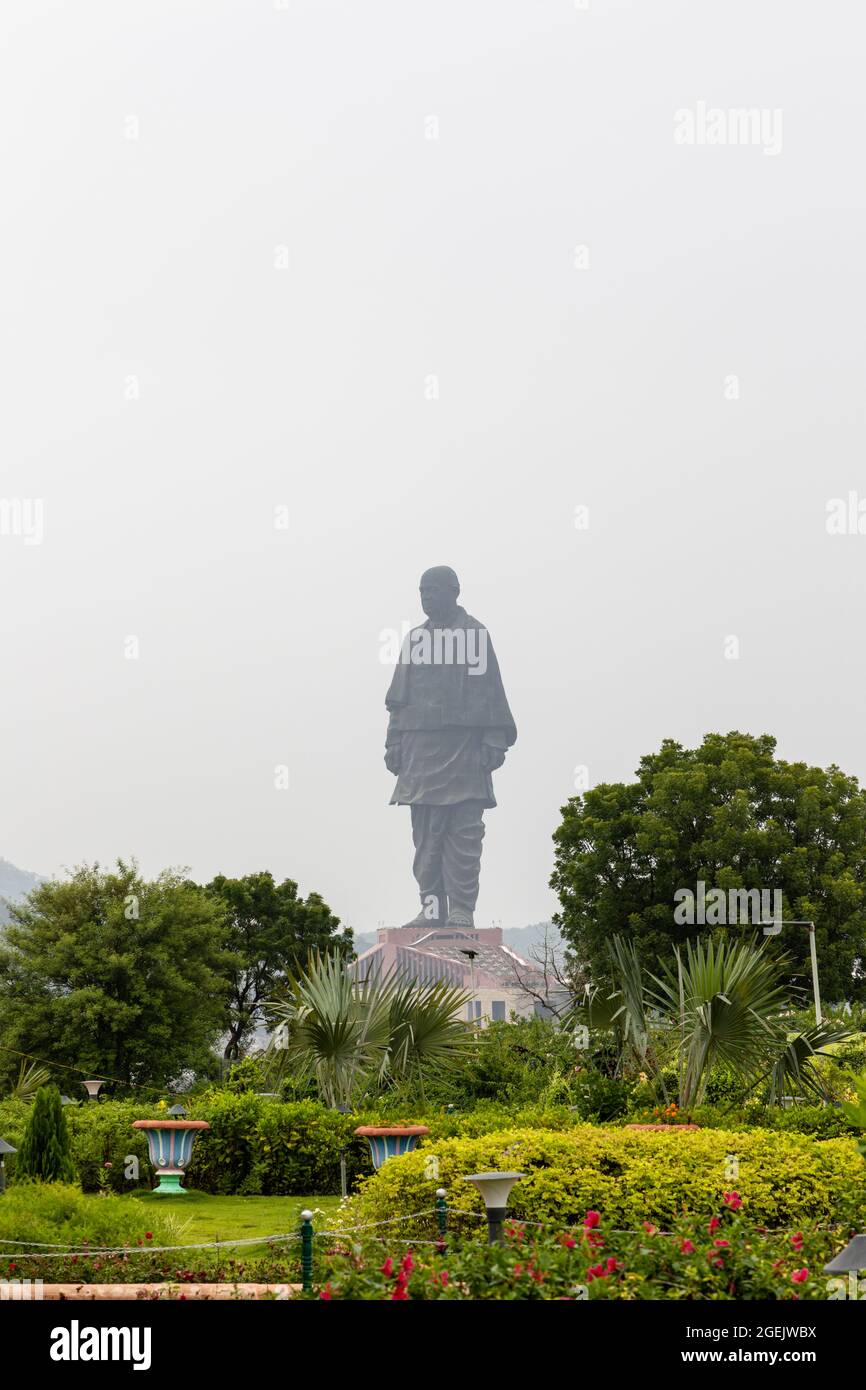 Statue of Unity as seen from Valley of Flowers on a cloudy day at