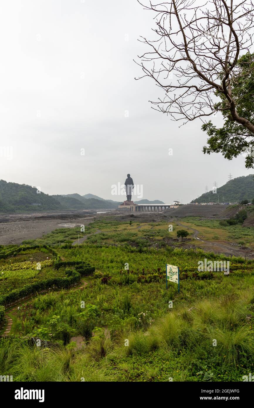 Statue of Unity as seen from Valley of Flowers on a cloudy day at