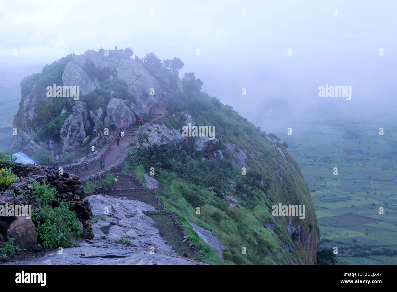Bunda mountain on a misty morning. The prayer mountain is popular with  Christians who spend days praying on the mountain. Malawi Stock Photo -  Alamy