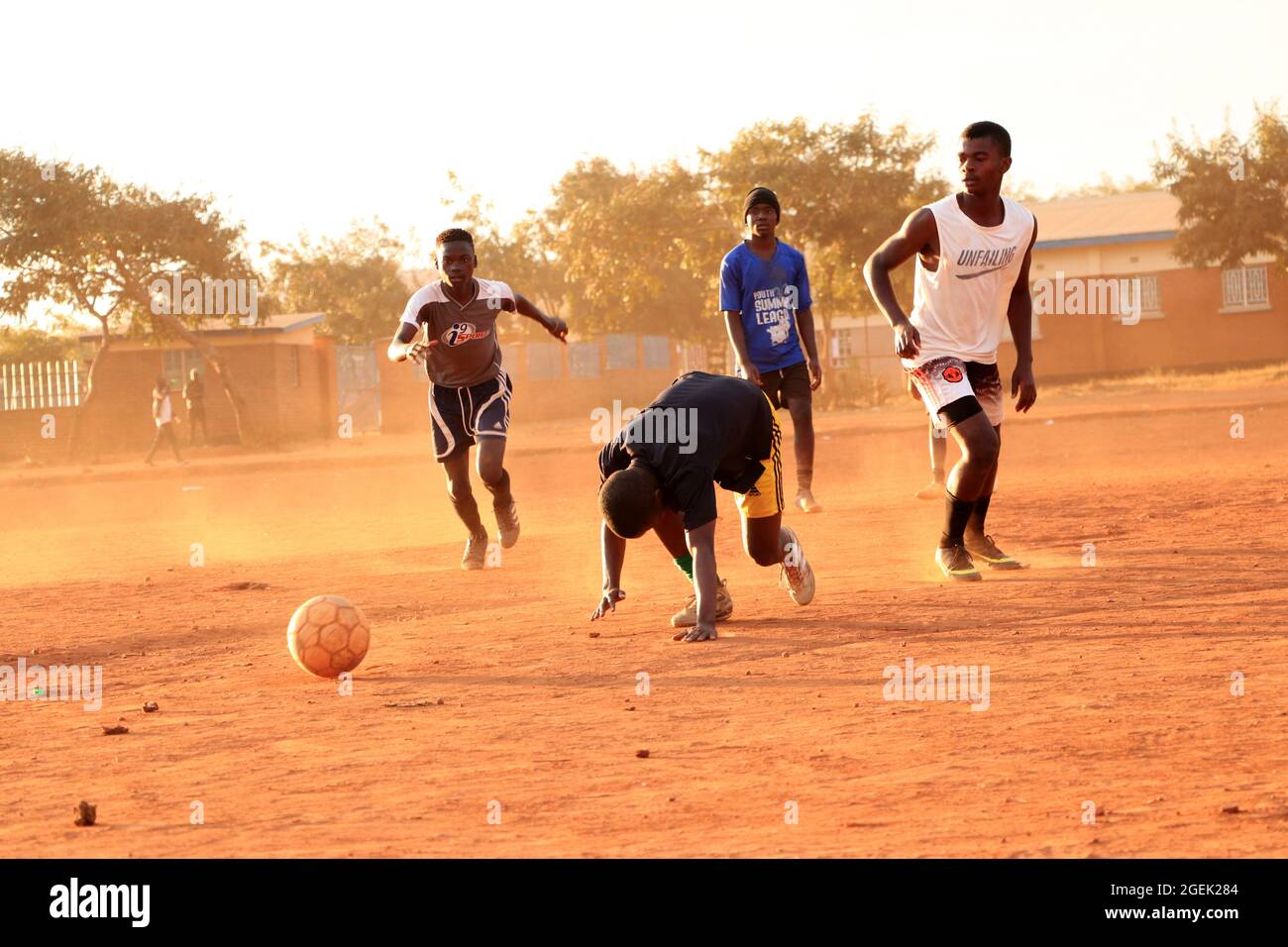 Rural boys playing soccer hi-res stock photography and images - Alamy