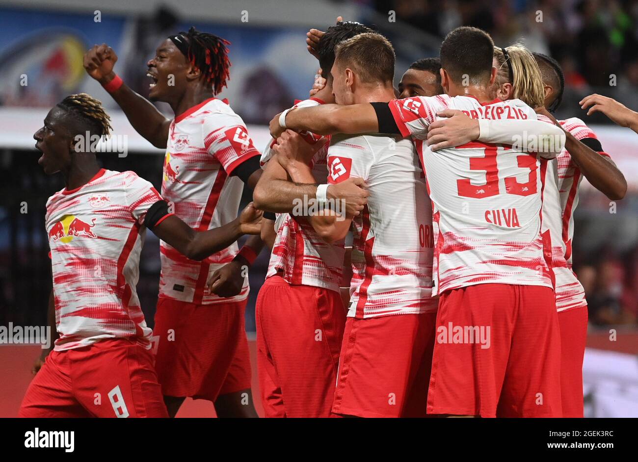 Leipzig, Germany. 20th Aug, 2021. Football, Bundesliga, RB Leipzig - VfB  Stuttgart, Matchday 2, Red Bull Arena: Leipzig players celebrate the goal  to make it 1:0. IMPORTANT NOTE: In accordance with the