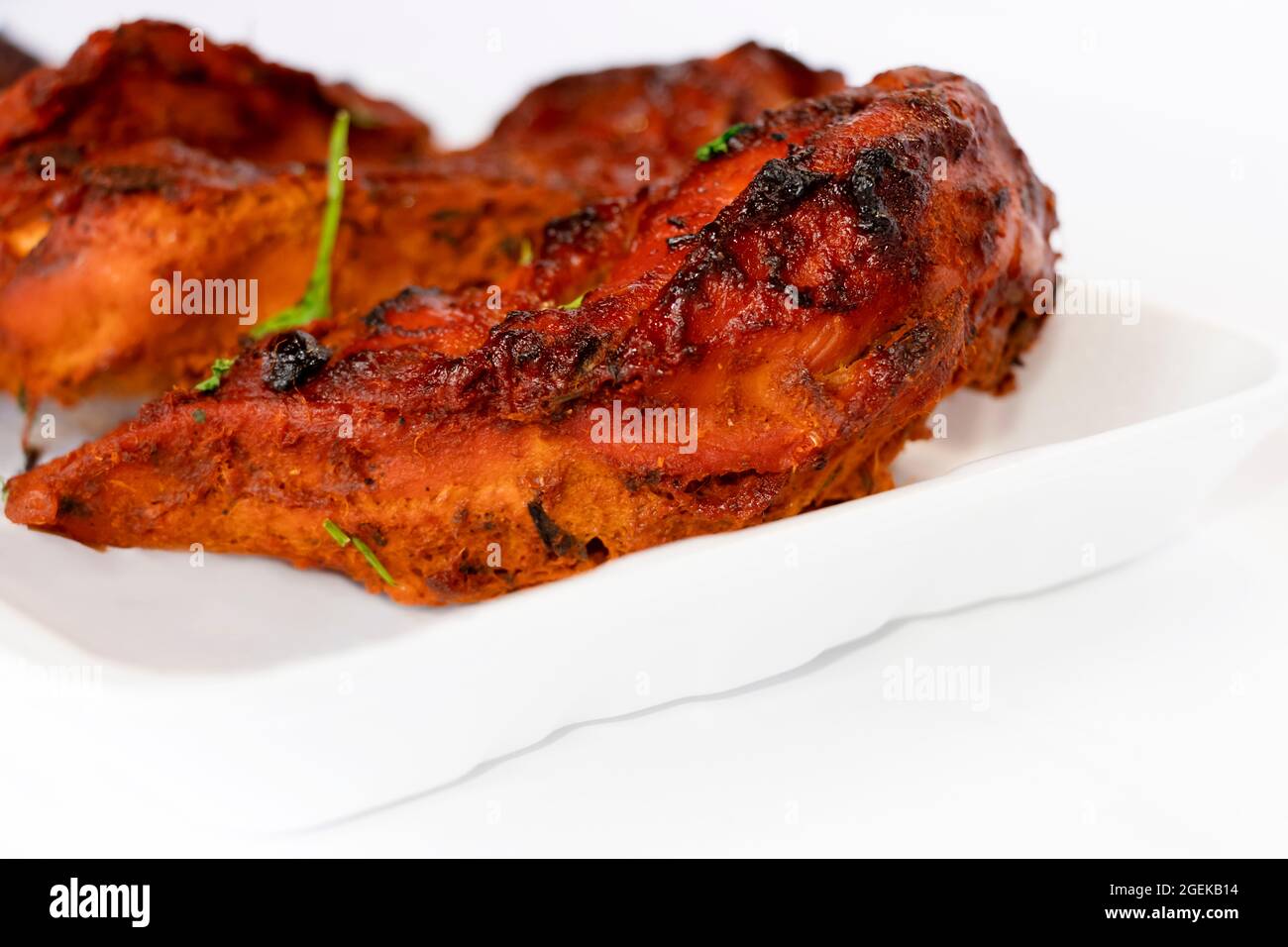 Closeup Image Of Kerala Style Chicken Fry In White Background. Side View, Shallow Depth Of Field Stock Photo