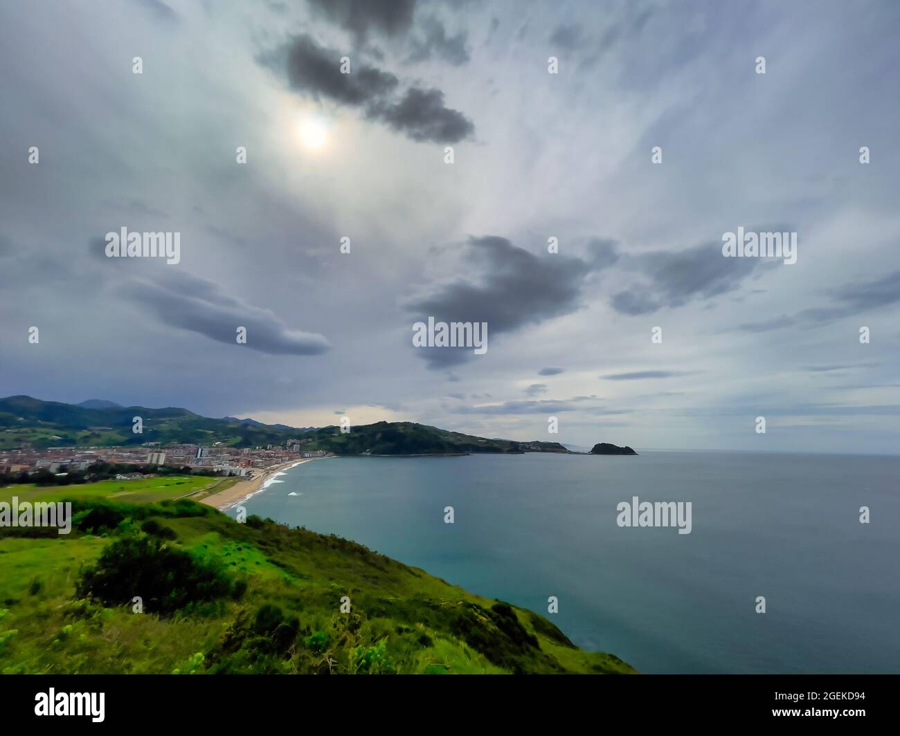 Panoramic view of the coast of Zarautz and the mouse-shaped mountain of Getaria, Gipuzkoa, Spain. Stock Photo