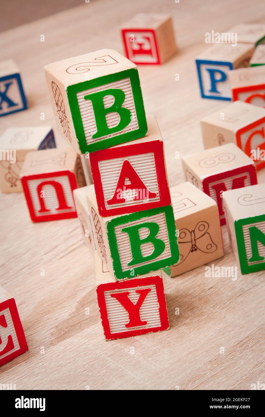 Toy blocks spelling out 'BABY' Stock Photo