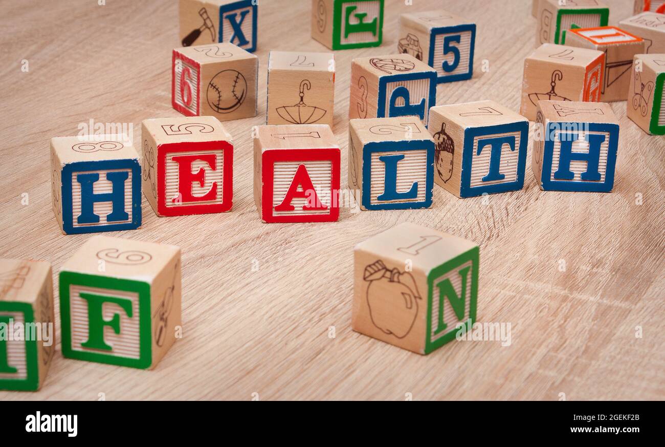 Toy blocks spelling out 'NEW BABY' Stock Photo