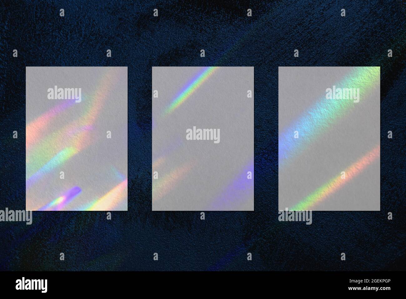 Three empty vertical rectangle poster mockup on dark blue background ...