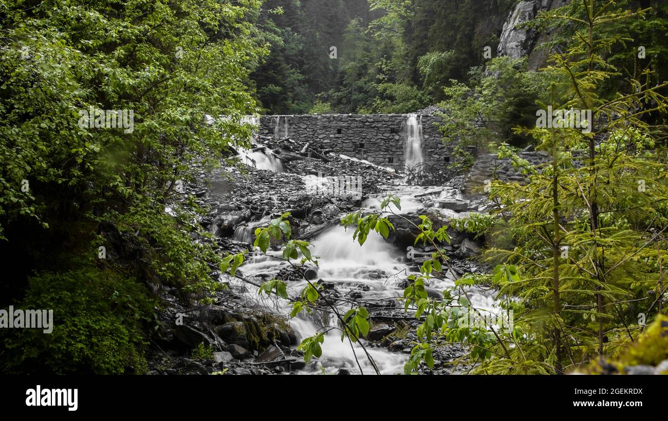Brick wall waterfall in the forest Stock Photo Alamy