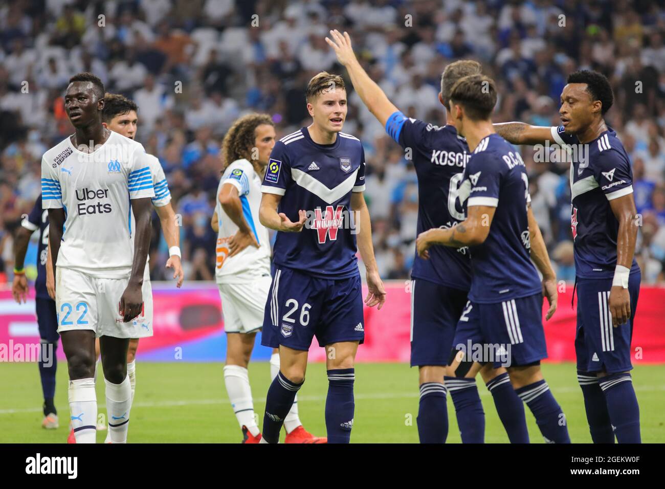 Toma Basic #26 of Girondins de Bordeaux discusses with his 