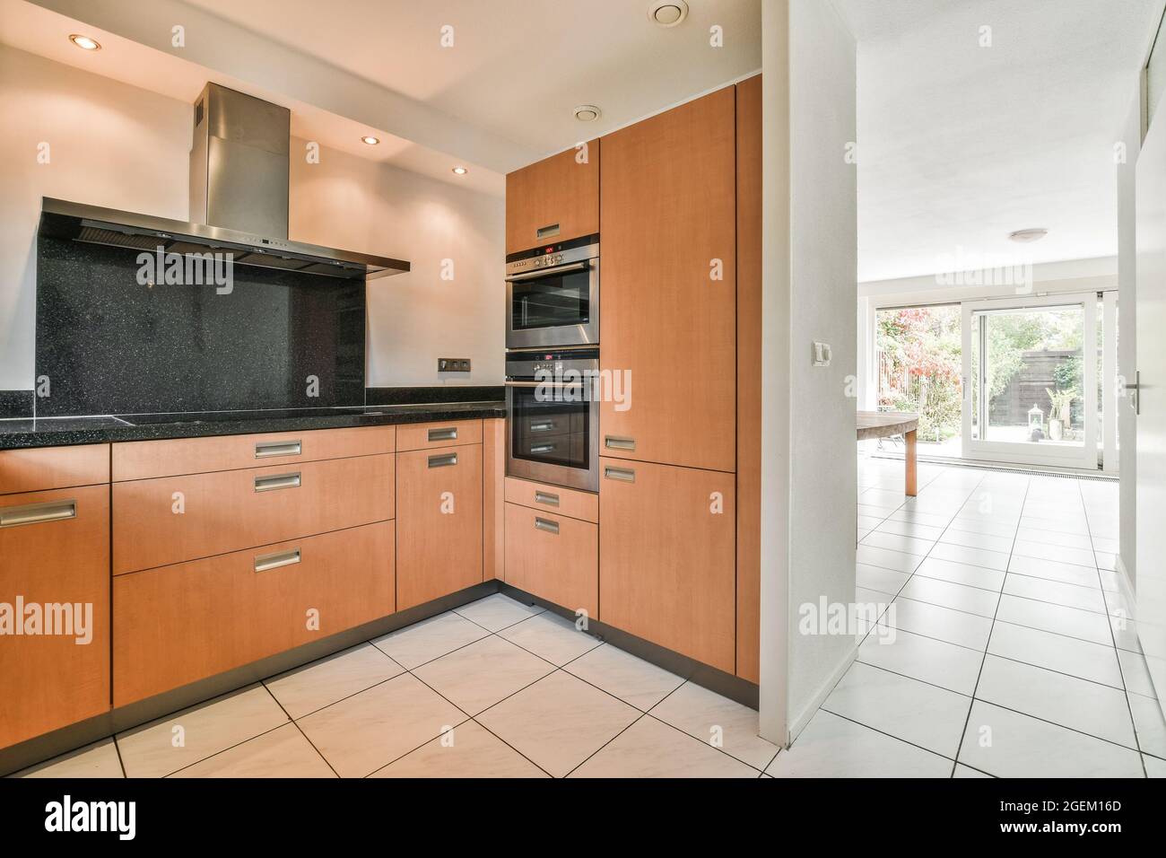 Modern kitchen interior with wooden furniture Stock Photo - Alamy