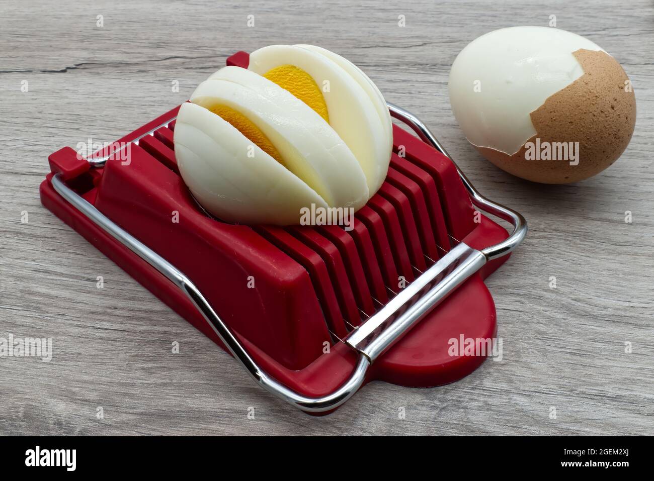 Egg Slicer And Boiled Eggs On The Saucers Closeup Stock Photo - Download  Image Now - Meat Slicer, Egg - Food, Bamboo - Material - iStock