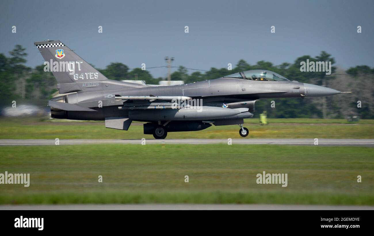 An 84th Test and Evaluation Squadron F-16 Fighting Falcon soars down the runway for a take-off July 30 at Eglin Air Force Base, Fla.  The 84th TES is a Reserve unit of the 53rd Wing headquartered at Eglin.  (U.S. Air Force photo/1st Lt. Karissa Rodriguez) Stock Photo