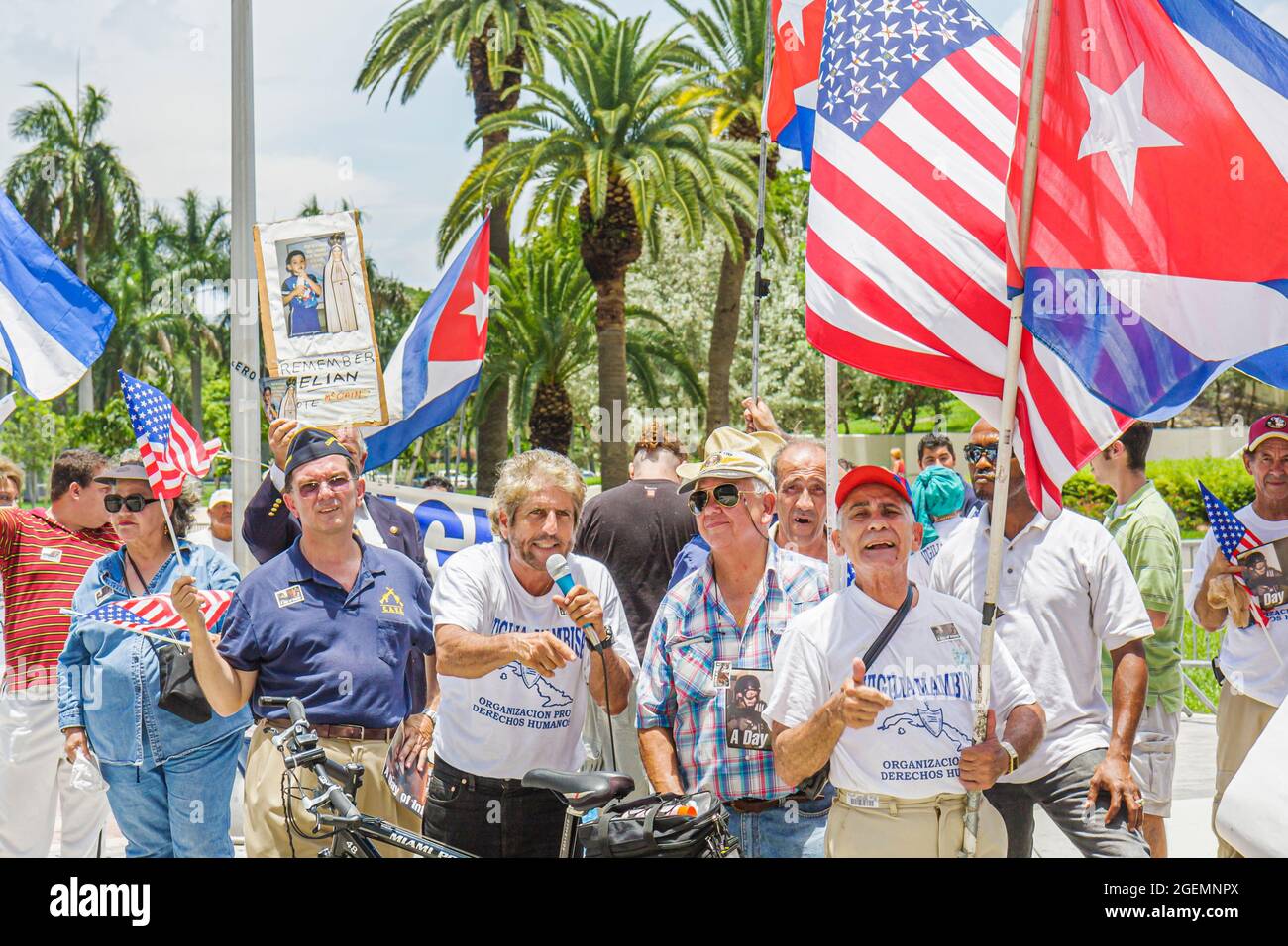 Miami Florida,Biscayne Boulevard Cuban protesters protest exile group,Vigilia Mambisa Hispanic men male flags demonstrate Miguel Saavedra, Stock Photo