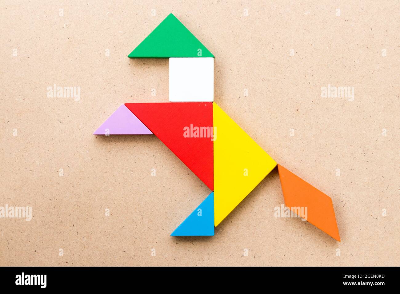 Color Tangram Puzzle In Exciting Horse Shape On Wood Background Stock 