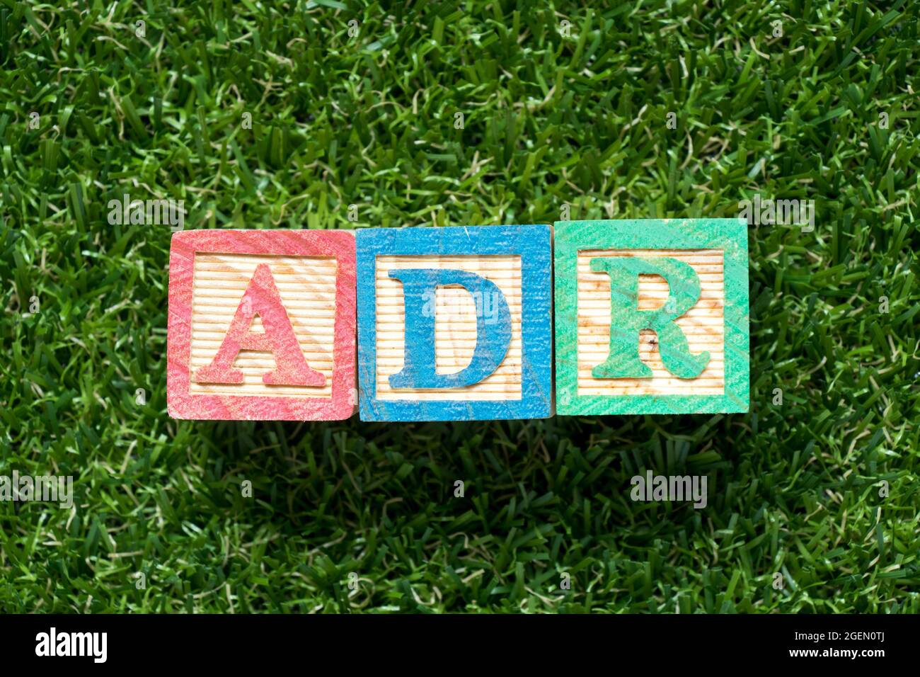 Color Wood Block In Word ADR Abbreviation Of Adverse Drug Reaction On Artificial Green Grass 
