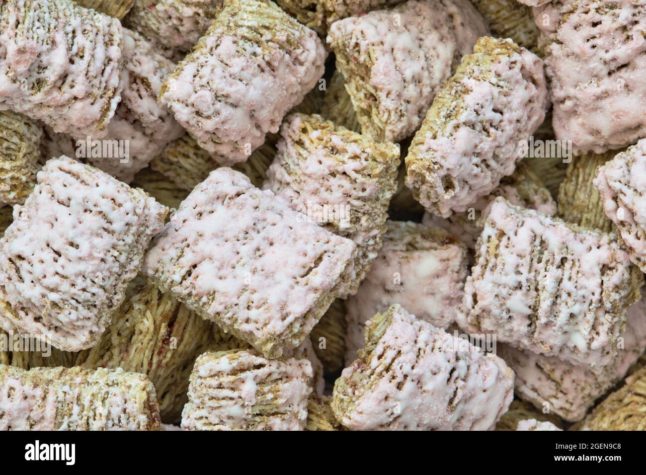 Shredded wheat biscuits breakfast cereal with strawberry flavoring