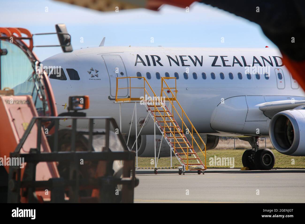 Christchurch, New Zealand. 21st Aug, 2021. An Air New Zealand plane sits grounded at Christchurch International Airport as some flights have been cancelled, yet in other cases extra flights have been put on to allow people to travel home from locations around NZ. As of today, there are 21 new cases of COVID-19 bringing the total to 51 Covid-19 cases in Auckland. Prime Minister Jacinda Ardern yesterday placed areas outside Auckland and Coromandel into a further lockdown until 11.59 pm on Tuesday. (Photo by Adam Bradley/SOPA Images/Sipa USA) Credit: Sipa USA/Alamy Live News Stock Photo