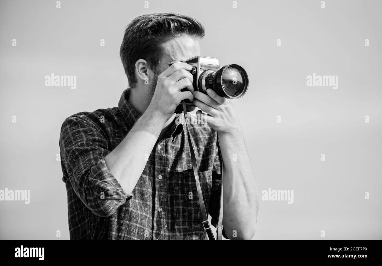Reporter taking photo. Manual settings. Travel blogger. Vintage ...