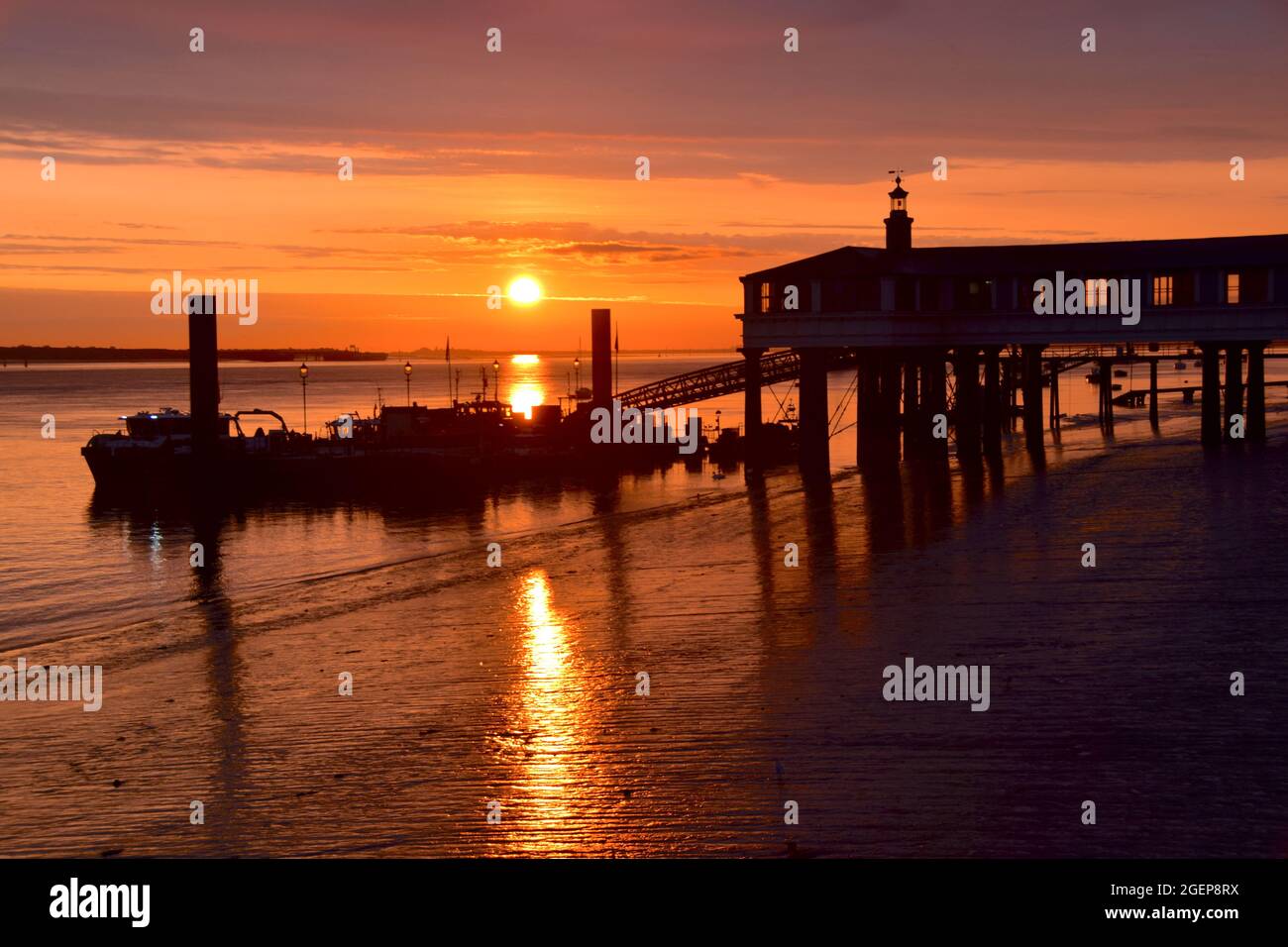 21/08/2021 Gravesend UK Dawn breaks above the River Thames near