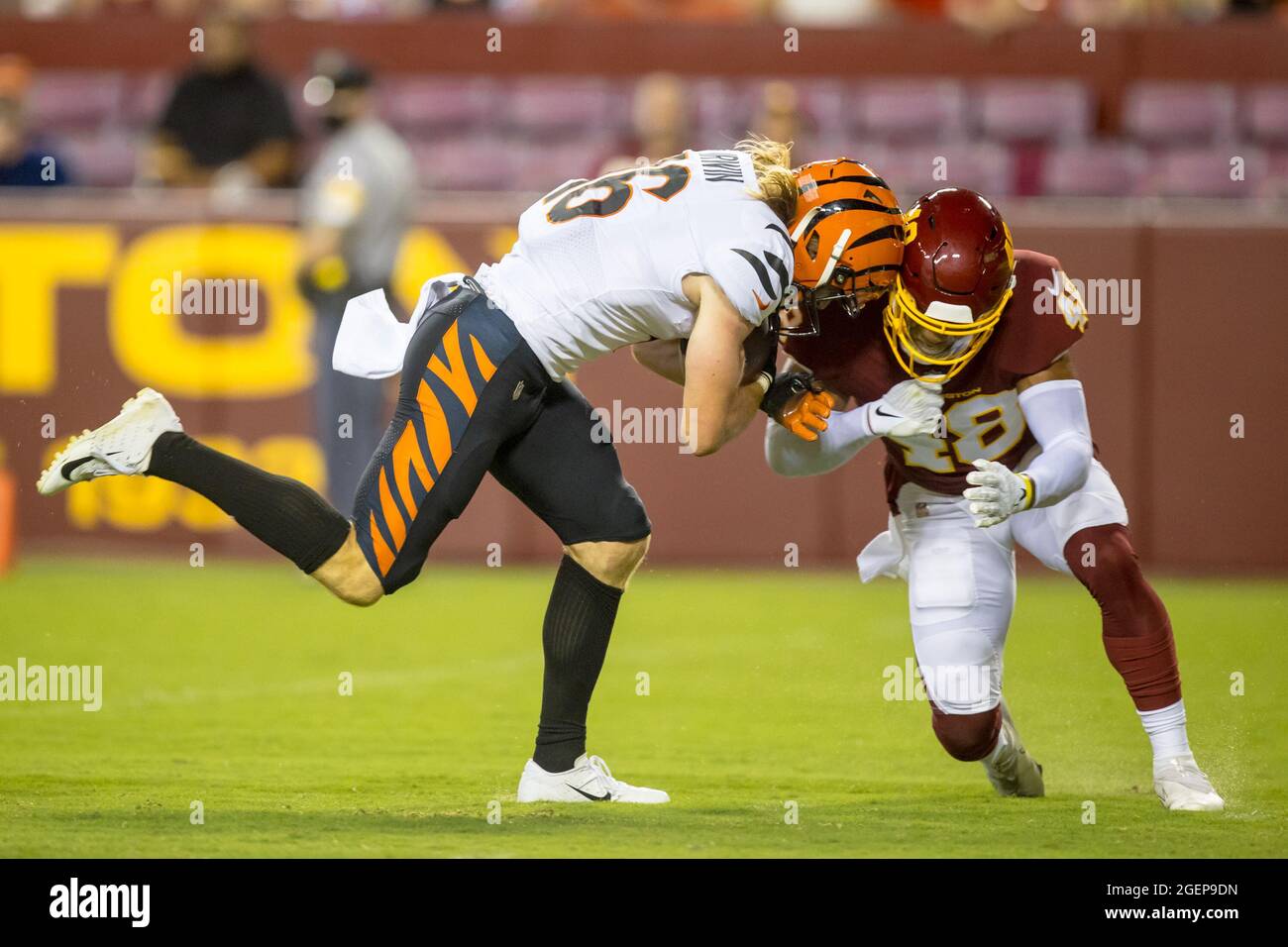 Maryland, USA. 20th Aug, 2021. August 20, 2021: Cincinnati Bengals wide  receiver Trenton Irwin (16) catches the pass and is hit hard by Washington  Football Team safety Darrick Forrest (48) causing him