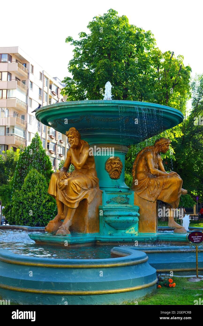 Green Fountain With Bronze Sitting Women Statues at City Center of ...