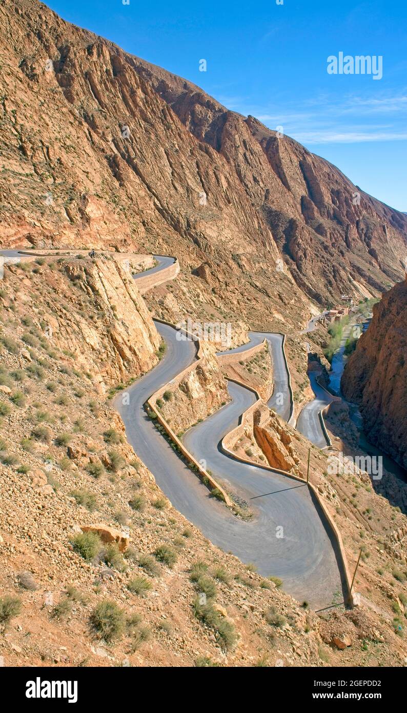 The twisting road winding down the gorge to the Oued Dades below, near Boumalne Dades, Morocco. Stock Photo