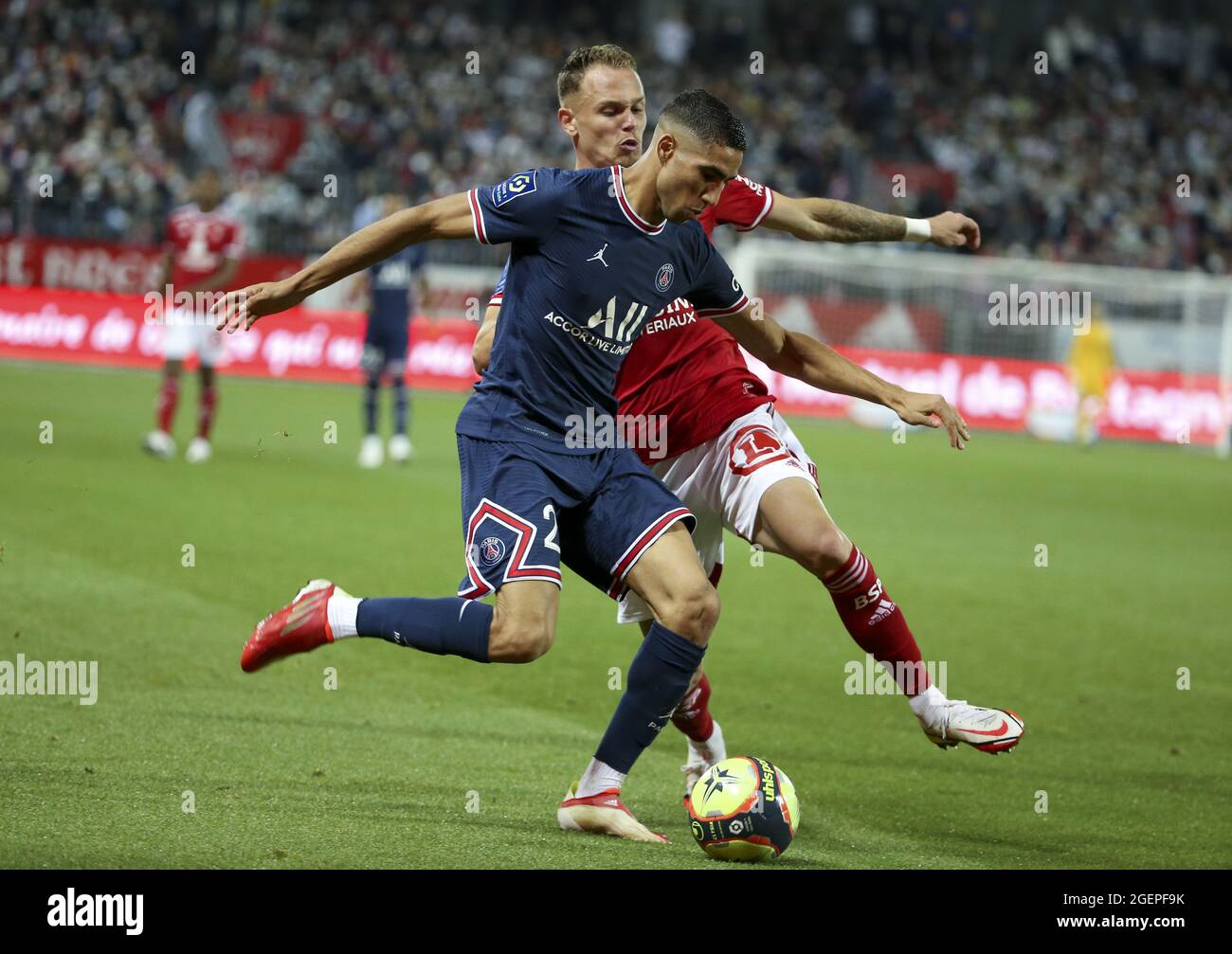 Brest, France. 20th Aug, 2021. Achraf Hakimi of PSG, Irvin Cardona of Brest  during the French championship Ligue 1 football match between Stade  Brestois 29 and Paris Saint-Germain (PSG) on August 20,