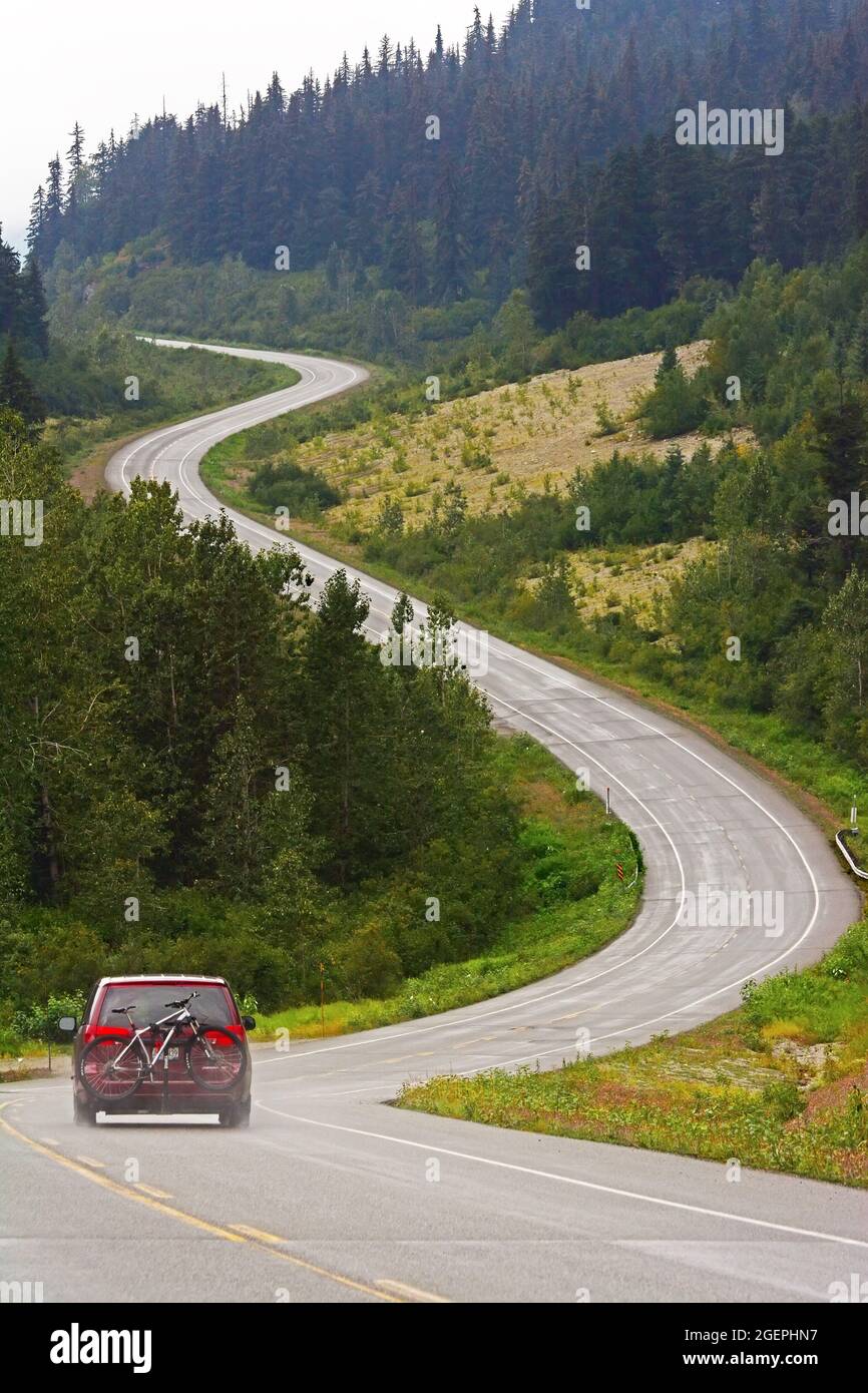 A car driving on Yukon road Stock Photo