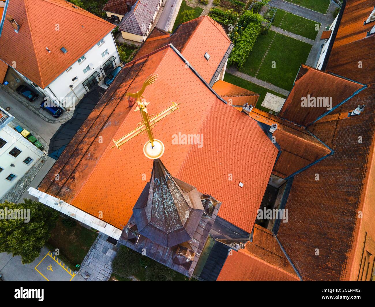 Red Roof and Church Tower in Novo Mesto Slovenia. Drone View. Stock Photo