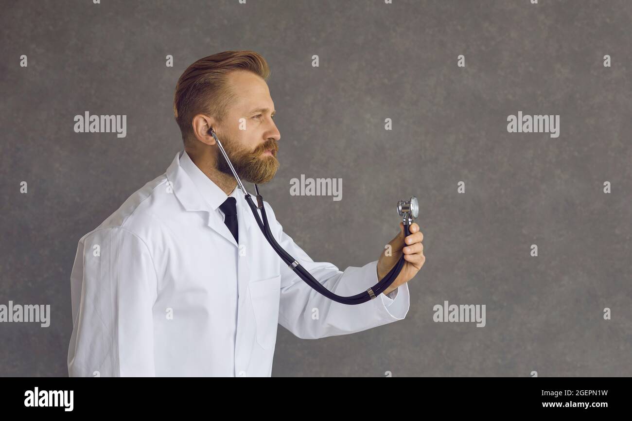Medical exam young man stethoscope hi-res stock photography and images ...