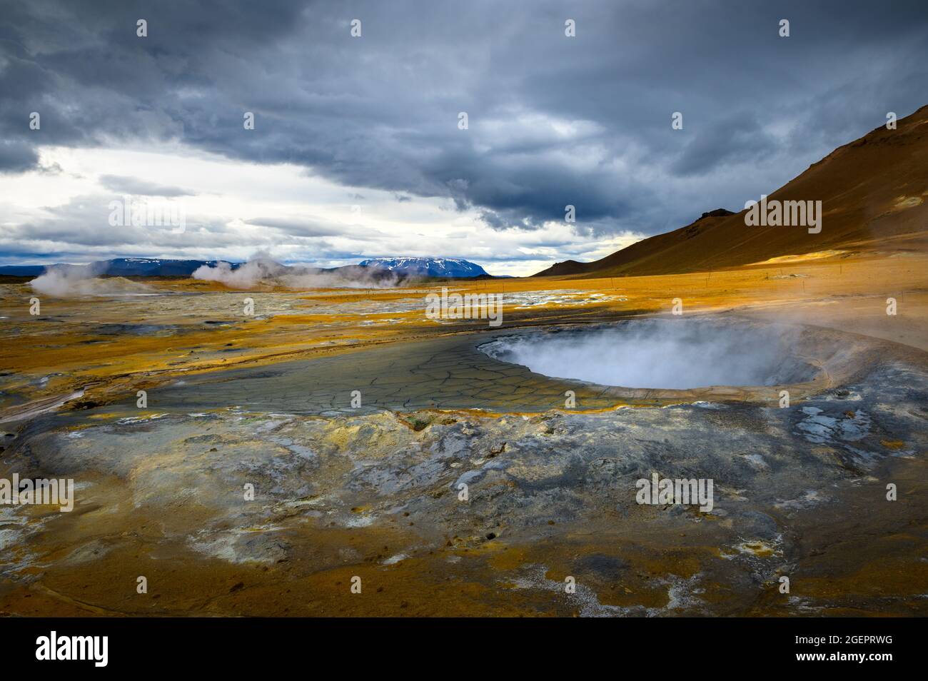 Steaming mud pool in the Hverir geothermal area in Iceland Stock Photo