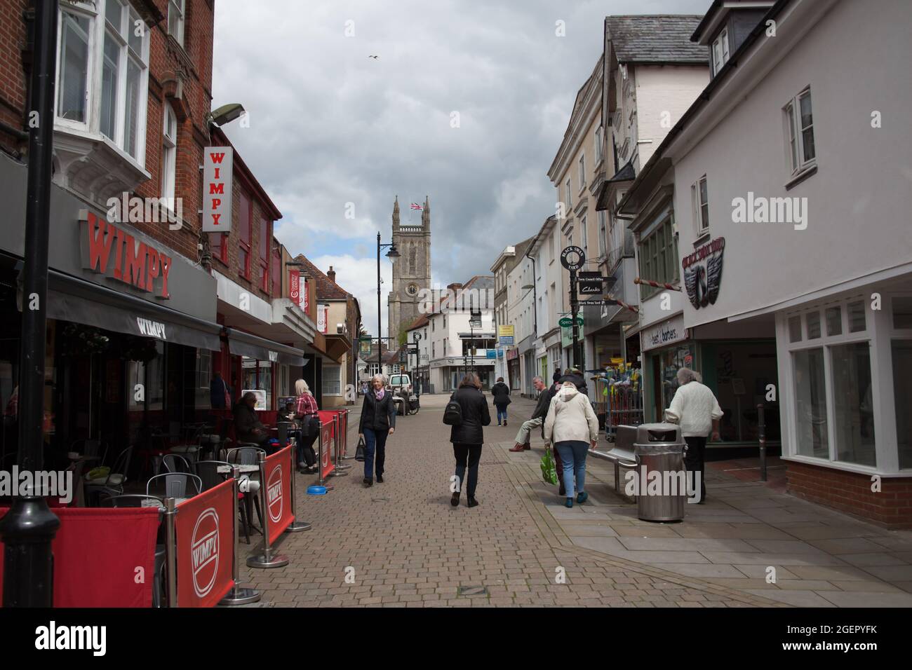 Shoppers on Andover High Street in Hampshire, UK Stock Photo