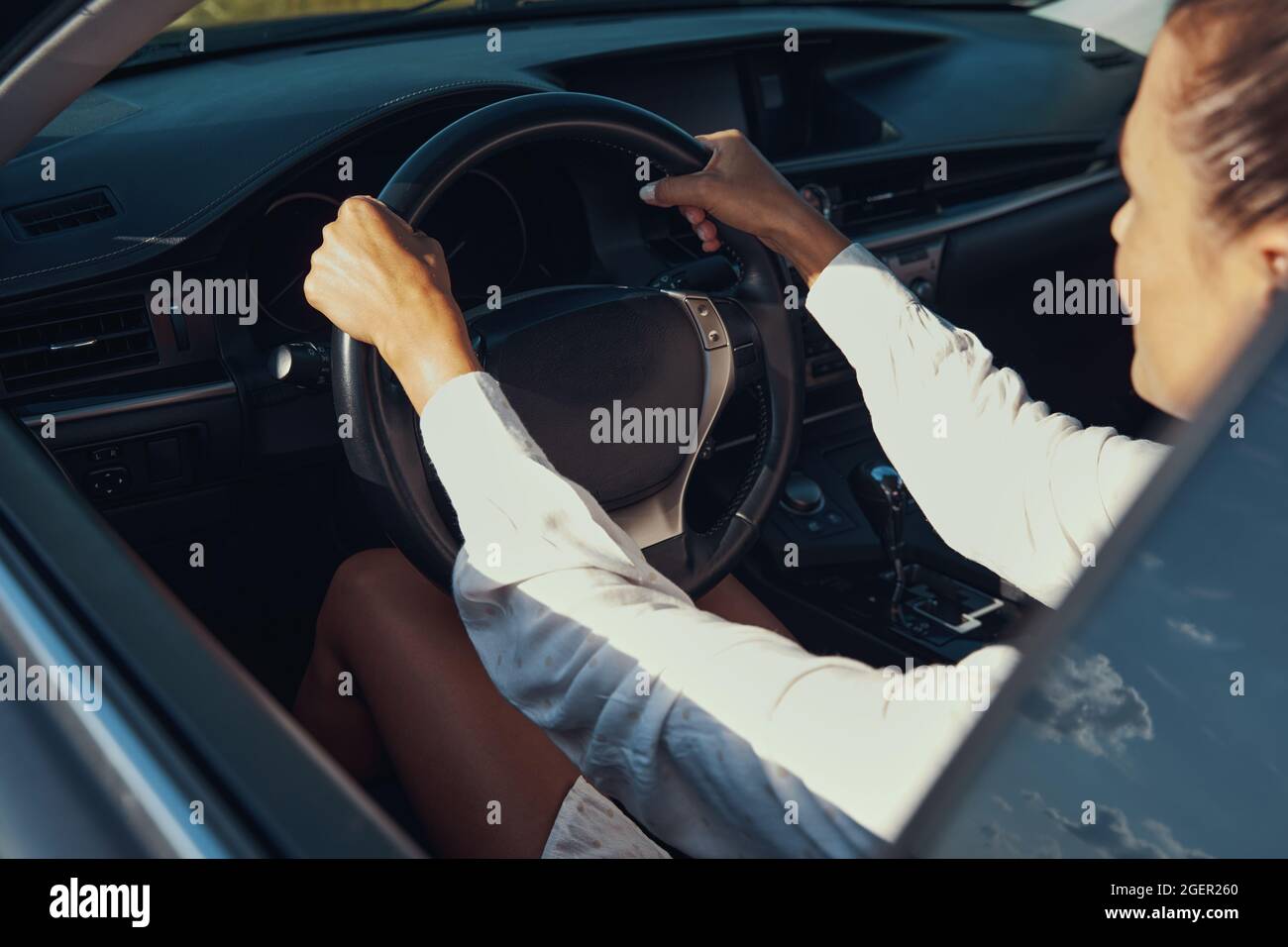 Lady behind wheel hi-res stock photography and images - Alamy