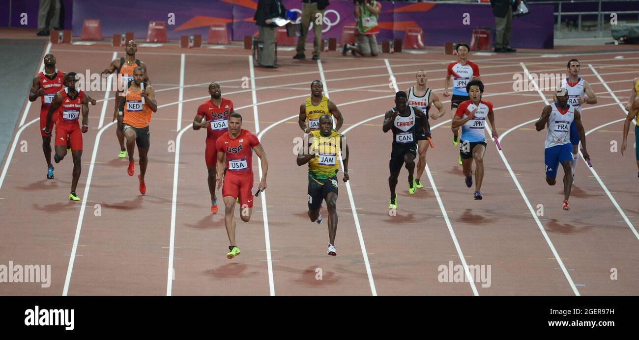 Usain Bolt wins gold in the 4 x 100m men's final on the final night of Athletics at Olympic Stadium, London 11 August 2012 Stock Photo