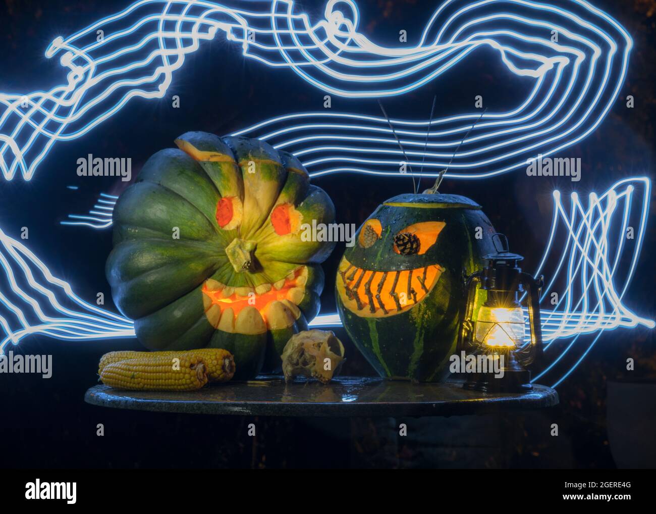 Halloween pumpkin head jack lantern with burning candles in a scary ...