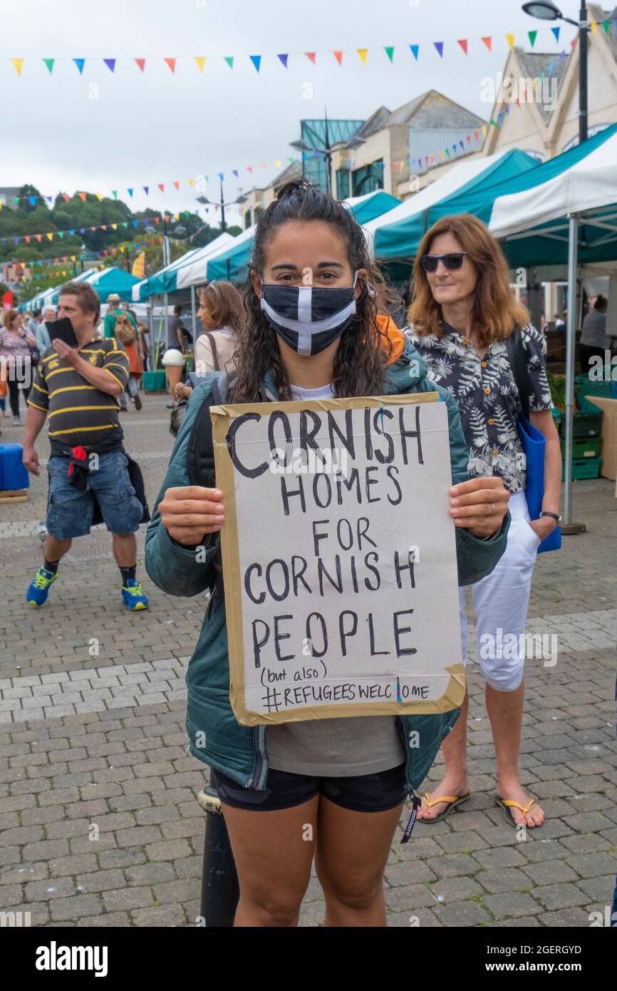 Truro, Cornwall, UK. 21st August, 2021.  Cornwall’s housing crisis is so bad hundreds attended a protest in Truro today.  The sale of second homes is leaving Cornwall families unable to get on the housing ladder.  Rental opportunities have been slashed by landlords turning flats and houses into AirB+B. Stock Photo