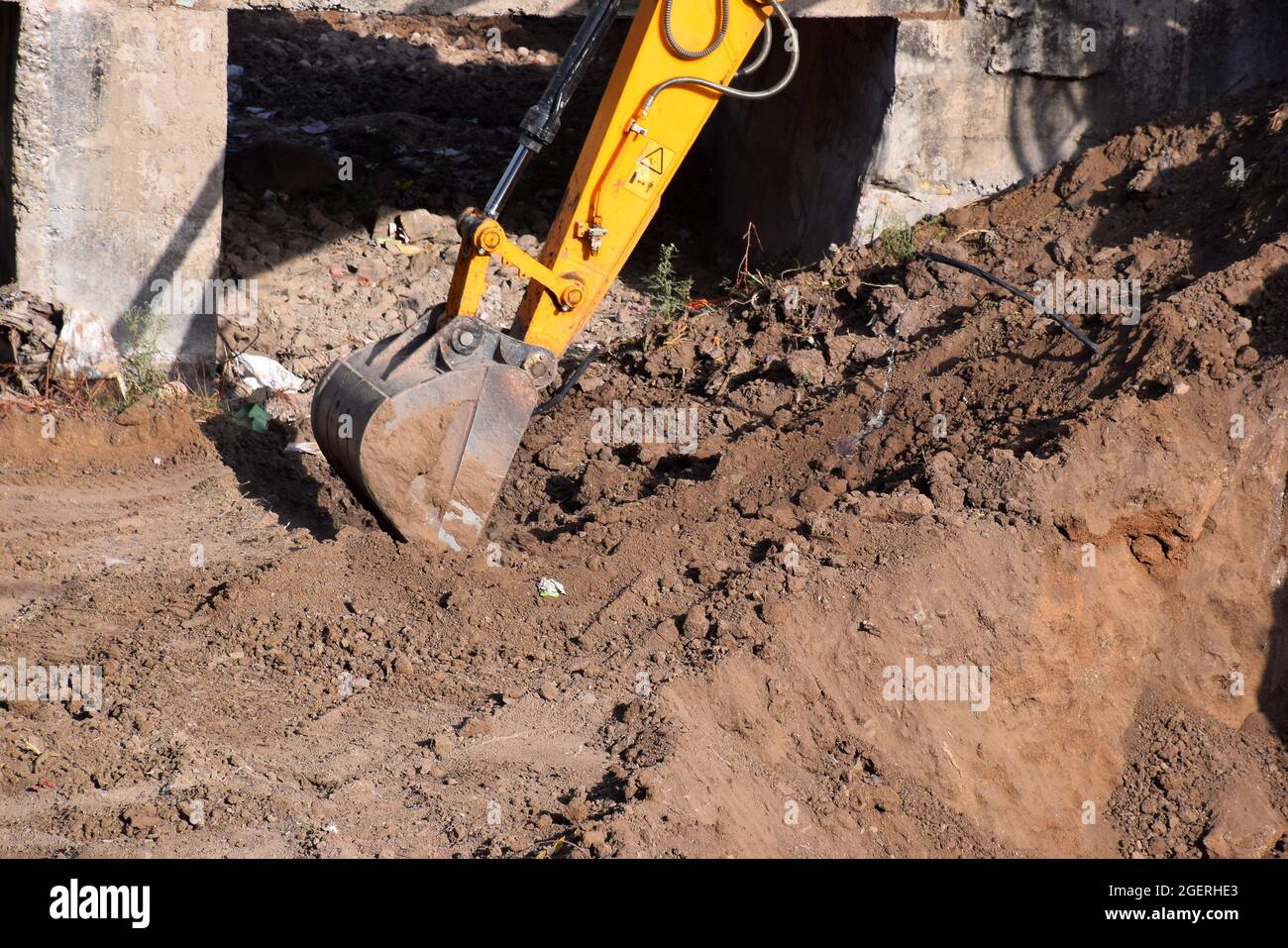 08-05-2020,Bhadapipalya, Madhya Pradesh, India, The modern excavator JCB performs excavation work on the construction site Stock Photo