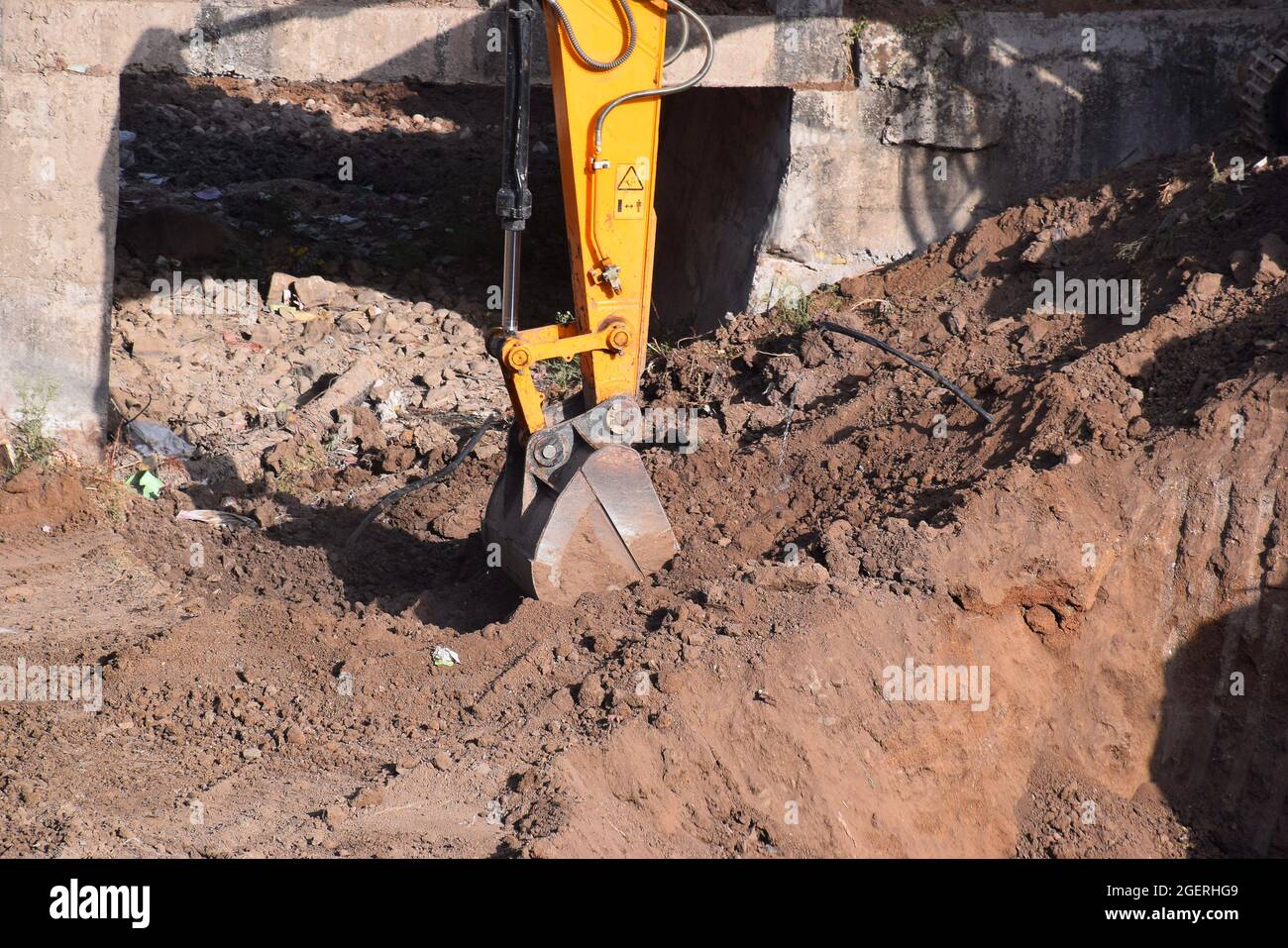 08-05-2020,Bhadapipalya, Madhya Pradesh, India, The modern excavator JCB performs excavation work on the construction site Stock Photo