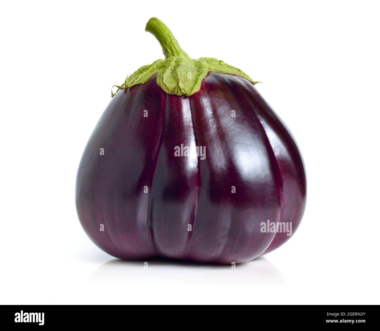 Segmented purple eggplant isolated on white background Stock Photo