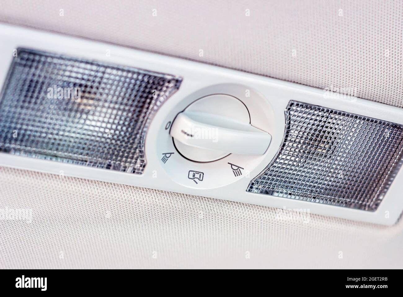 Lamp light control panel inside the car in the automobile ceiling for