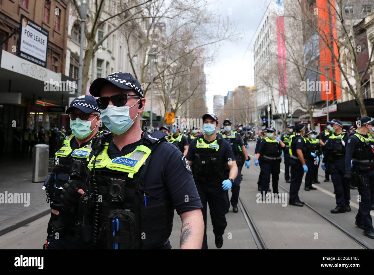 Melbourne, Australia, 21 August, 2021. Hundreds of police are seen during the Freedom protest on August 21, 2021 in Melbourne, Australia. Freedom protests are being held around the country in response to the governments COVID-19 restrictions and continuing removal of liberties.  Credit: Dave Hewison/Speed Media/Alamy Live News Stock Photo