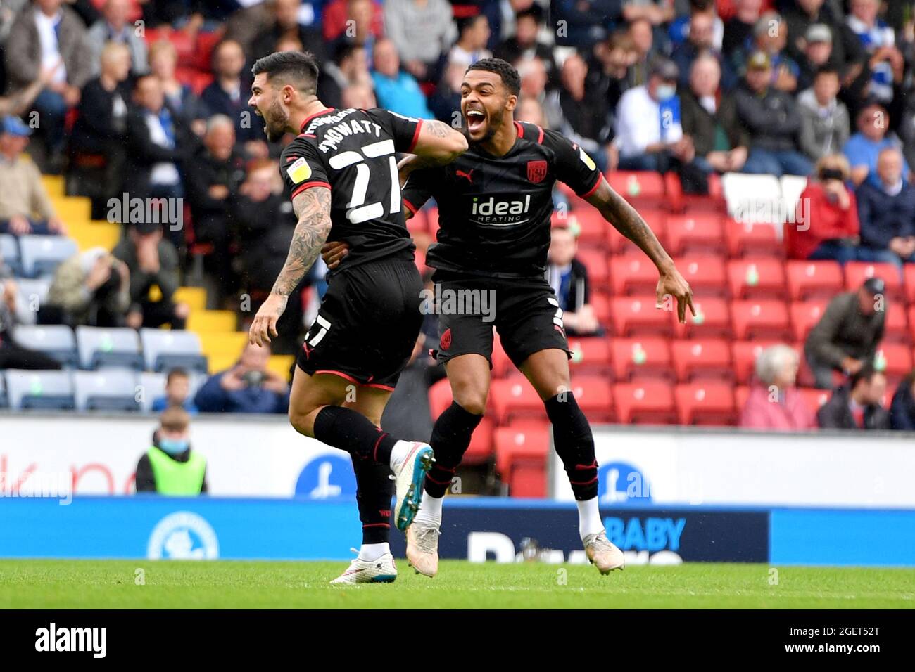West Bromwich Albion's Alex Mowatt (left)celebrates scoring his side's first goal of the game with West Bromwich Albion's Darnell Furlong during the Sky Bet Championship match at Ewood Park, Blackburn. Picture date: Saturday August 21, 2021. Stock Photo