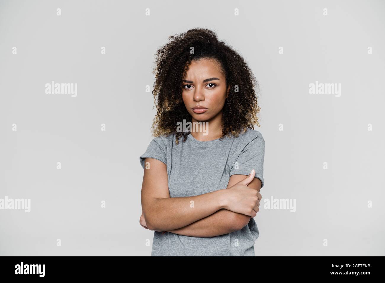 Offended woman crossing arms hi-res stock photography and images - Alamy