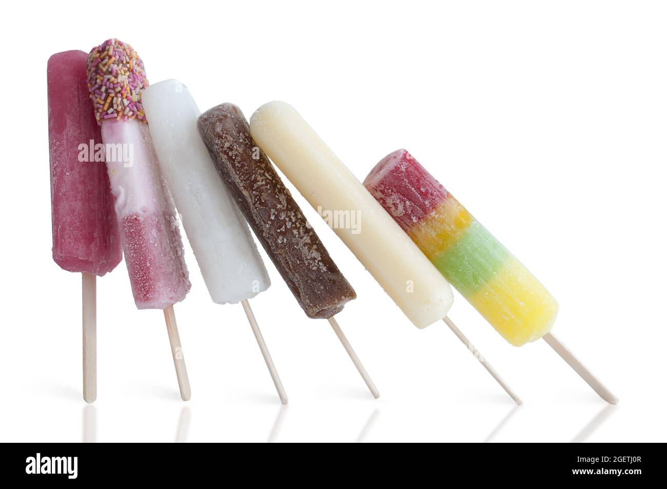 Frozen assorted ice lollies on a white background Stock Photo
