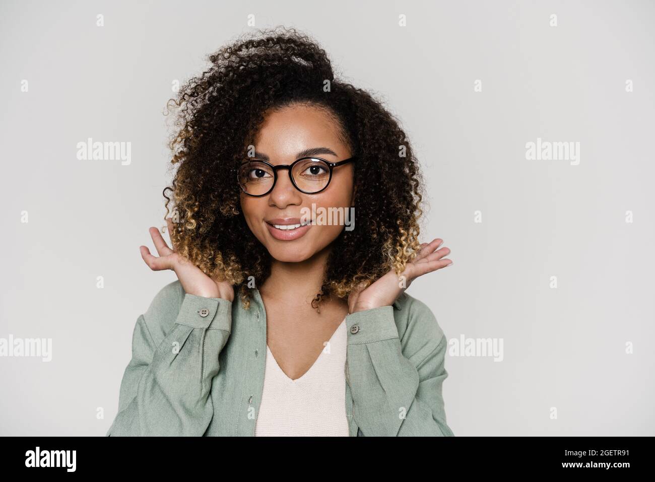 Woman curly hair glasses hi-res stock photography and images - Alamy