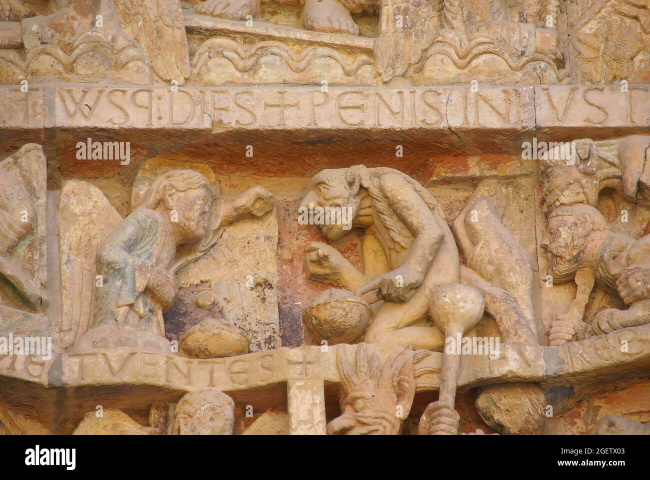 Last Judgment carving showing tortures and punishments of Hell,  from the 13th century, Abbey Church of St. Foy, Conques, France Stock Photo