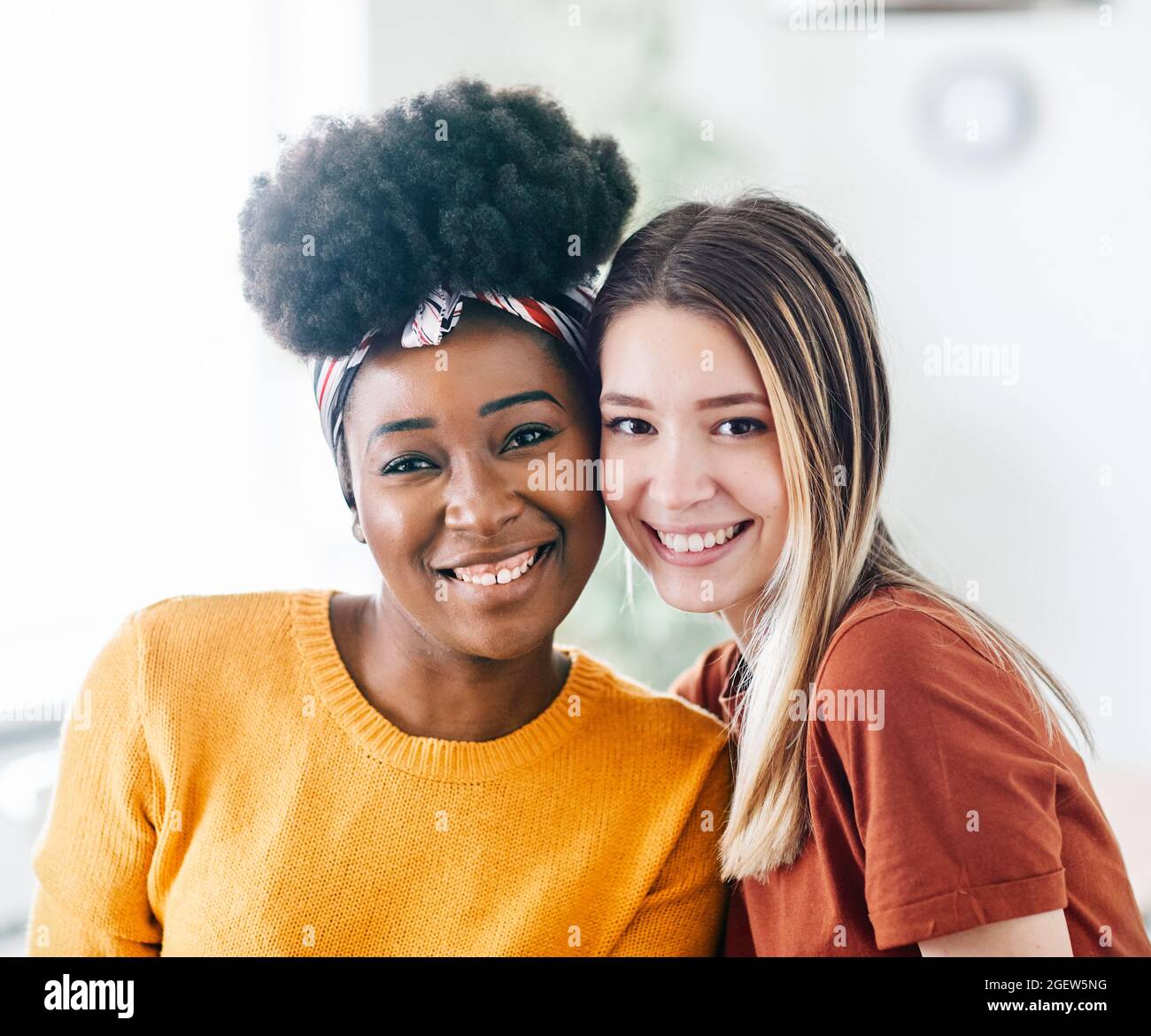 young woman girl friend friendship portrait smiling two love Stock Photo