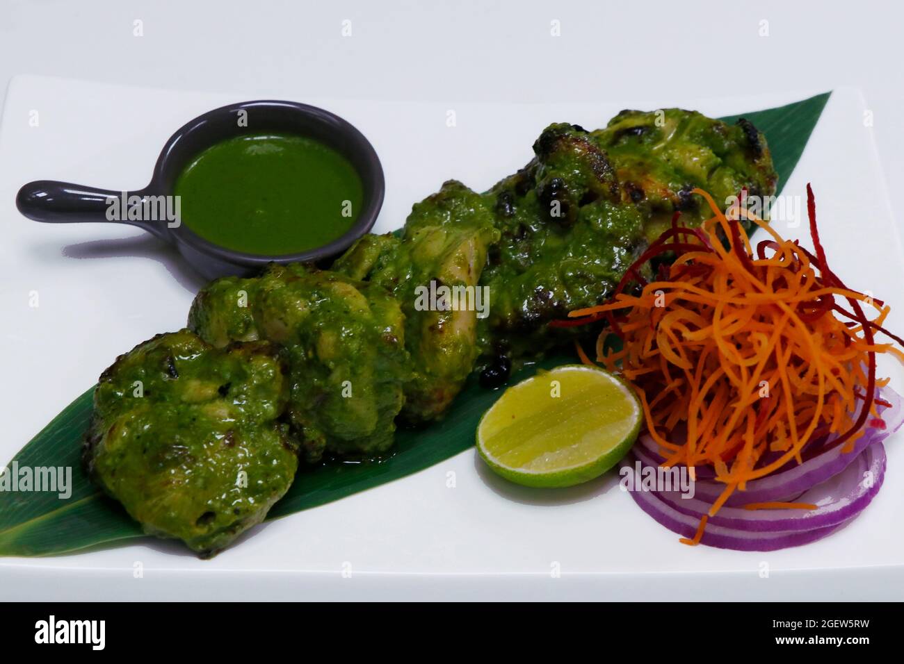 hariyali chicken tikka. mint, spinach and yoghurt marinated spiced