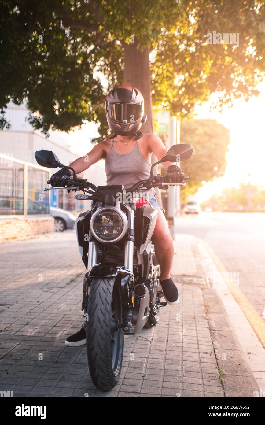 Woman wearing motorbike helmet hi-res stock photography and images - Page 2  - Alamy